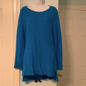 Great tunic sweater. Beautiful bright blue with cable print